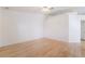 Spacious bedroom featuring wood floors, fresh white paint and ample natural light at 4176 Skywalker Ave, Las Vegas, NV 89120