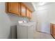 Laundry room featuring side-by-side washer and dryer and cabinet storage above at 4176 Skywalker Ave, Las Vegas, NV 89120
