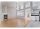 Open floor plan features living room fireplace and view of the kitchen at 4176 Skywalker Ave, Las Vegas, NV 89120