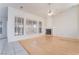 Spacious living room featuring hardwood floors, fireplace, and bright natural light at 4176 Skywalker Ave, Las Vegas, NV 89120