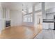 Open floor plan features living room fireplace and view of the kitchen at 4176 Skywalker Ave, Las Vegas, NV 89120