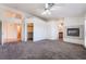 Large main bedroom with fireplace, ceiling fan, walk-in closet, and ensuite bathroom at 4176 Skywalker Ave, Las Vegas, NV 89120