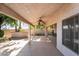 Covered patio area with ceiling fans, lighting, and a counter bar at 4176 Skywalker Ave, Las Vegas, NV 89120