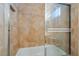 Shower with glass door and tile surround at 4176 Skywalker Ave, Las Vegas, NV 89120