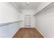 Walk-in closet with shelving and hanging rods at 4176 Skywalker Ave, Las Vegas, NV 89120