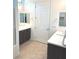 Bathroom featuring double vanities, tile flooring, and plenty of natural light at 8550 Lost Pony St, Las Vegas, NV 89148