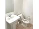 Bathroom with a toilet and sink with a square basin at 8550 Lost Pony St, Las Vegas, NV 89148