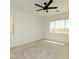 Bright bedroom featuring a modern ceiling fan and neutral carpet at 8550 Lost Pony St, Las Vegas, NV 89148