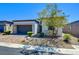 Charming home featuring modern architecture and low-maintenance landscaping at 8550 Lost Pony St, Las Vegas, NV 89148