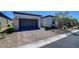 Charming single-Gathering home with brick paver driveway and desert landscaping at 8550 Lost Pony St, Las Vegas, NV 89148