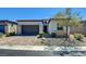 Charming single-Gathering home with brick paver driveway and desert landscaping at 8550 Lost Pony St, Las Vegas, NV 89148