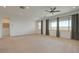 Spacious living area offers large windows with plenty of natural light and neutral decor, perfect for relaxing at 8550 Lost Pony St, Las Vegas, NV 89148
