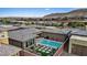 Beautiful aerial shot of backyard pool with well manicured landscaping and backyard entertainment space at 10018 Regency Square Ave, Las Vegas, NV 89148