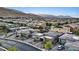 Picturesque aerial view showcases the neighborhood's layout, scenic surroundings, and access to nearby amenities at 10018 Regency Square Ave, Las Vegas, NV 89148