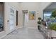 Inviting foyer with stylish tile flooring, bright lighting, and elegant decor at 10018 Regency Square Ave, Las Vegas, NV 89148