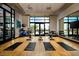 A well-equipped gym featuring exercise bikes, yoga mats, and a variety of fitness equipment for residents at 10018 Regency Square Ave, Las Vegas, NV 89148