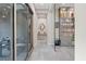 Hallway with sliding glass doors and sleek decor at 10018 Regency Square Ave, Las Vegas, NV 89148