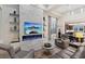 Stylish living room featuring a modern fireplace and sleek furniture at 10018 Regency Square Ave, Las Vegas, NV 89148