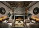 Beautiful living room with neutral colors, a fireplace, and modern decor at 10018 Regency Square Ave, Las Vegas, NV 89148