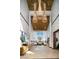 Elegant lobby featuring high ceilings, modern lighting fixtures, stone walls and comfortable seating areas at 10018 Regency Square Ave, Las Vegas, NV 89148