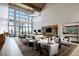 A modern lounge area with comfortable seating, a large TV, and stylish décor in a community space at 10018 Regency Square Ave, Las Vegas, NV 89148