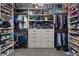 Walk-in closet with extensive custom shelves and storage for shoes and clothes at 10018 Regency Square Ave, Las Vegas, NV 89148