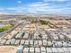 Wide aerial perspective of homes showcases community design, residential area, and overall neighborhood appeal at 11228 Burning River St, Las Vegas, NV 89183