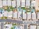 An aerial view highlights landscaped yards, swimming pools, and modern roofing in the community at 11228 Burning River St, Las Vegas, NV 89183