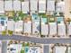 Overhead shot of residential rooftops, pools, and backyard landscaping; aerial view of 2204 Monterey Ave at 11228 Burning River St, Las Vegas, NV 89183