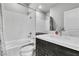 Bright bathroom with a tub and shower combination at 11228 Burning River St, Las Vegas, NV 89183