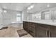 Bright bathroom with double vanities and a luxurious soaking tub at 11228 Burning River St, Las Vegas, NV 89183