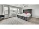 Spacious bedroom with a large window and stylish furniture at 11228 Burning River St, Las Vegas, NV 89183