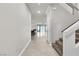 Inviting foyer with tiled flooring and staircase leading to the upper level at 11228 Burning River St, Las Vegas, NV 89183