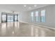 Spacious living room with tile flooring and lots of natural light at 11228 Burning River St, Las Vegas, NV 89183