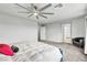 Spacious primary bedroom features a ceiling fan, and neutral decor at 11228 Burning River St, Las Vegas, NV 89183