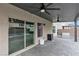 Covered patio with pavers, two ceiling fans, exterior barbecue and view of the swimming pool at 11228 Burning River St, Las Vegas, NV 89183