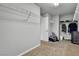 Spacious walk-in closet with wire shelving, carpet flooring and an open door at 11228 Burning River St, Las Vegas, NV 89183