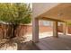 A covered patio provides shade and protection from the elements, making it a great spot to relax and enjoy the outdoors at 11668 Tierney Creek Dr, Las Vegas, NV 89183