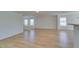 Inviting bonus room features wood floors, abundant natural light, and open space at 11668 Tierney Creek Dr, Las Vegas, NV 89183