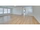 Open bonus room with ample light, wood floors, and multiple windows at 11668 Tierney Creek Dr, Las Vegas, NV 89183