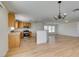 An open kitchen concept with a breakfast bar and stainless steel appliances at 11668 Tierney Creek Dr, Las Vegas, NV 89183