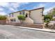 Side exterior of home featuring a small fenced yard and stucco siding at 11668 Tierney Creek Dr, Las Vegas, NV 89183