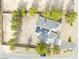 Birds eye view of desert home featuring mature trees and solar panels at 151 Hornet St, Pahrump, NV 89048