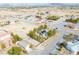 Aerial view displays a large property featuring desert landscaping and mature shade trees at 151 Hornet St, Pahrump, NV 89048