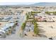 Birds eye view of desert home featuring mature landscaping and an RV parking area at 151 Hornet St, Pahrump, NV 89048