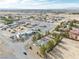 Beautiful aerial view of neighborhood homes, landscaping, and desert landscape at 151 Hornet St, Pahrump, NV 89048
