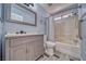 Bathroom featuring a vanity, a shower and tub combo, and gray walls at 151 Hornet St, Pahrump, NV 89048