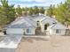 Lovely desert home with mature trees, solar panels, and a wide driveway at 151 Hornet St, Pahrump, NV 89048