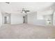 Bright bonus room with plush carpet, neutral walls, and recessed lighting, great for entertaining at 1512 Sagefield Way, Logandale, NV 89021