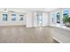 Bright, open living area connected to the kitchen, featuring lots of windows and natural light at 1512 Sagefield Way, Logandale, NV 89021